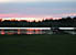 Although you would never know it, that's me fishing in the back of that boat (beyond the picnic table).